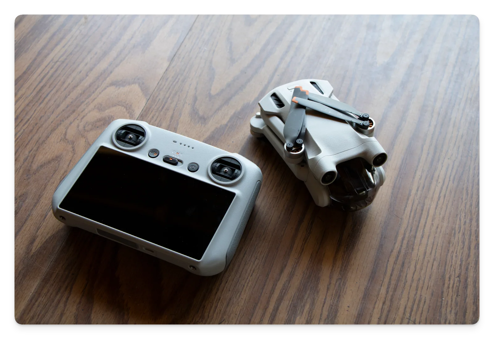 A photo of a DJI drone on a table.
