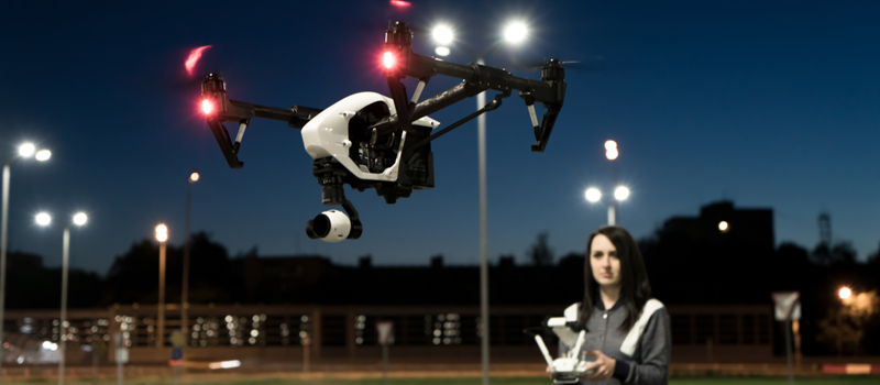 picture of a drone flying at night