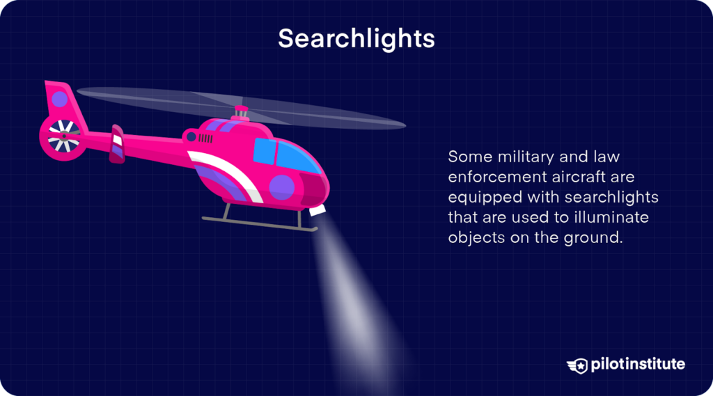 Helicopter with searchlight illuminating the ground, used by military and law enforcement aircraft.