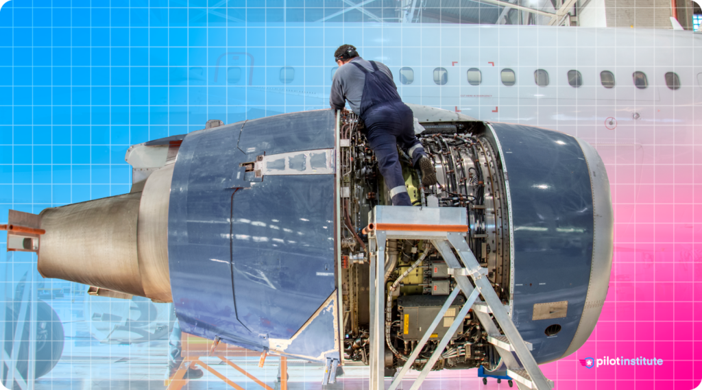 A mechanic works on an airliner turbine engine.