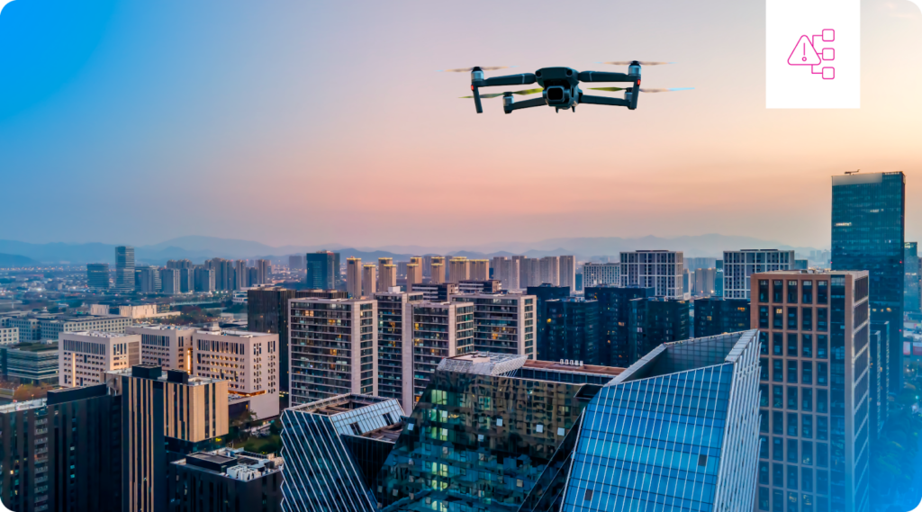 A drone flying over 400 feet above the ground over a city.