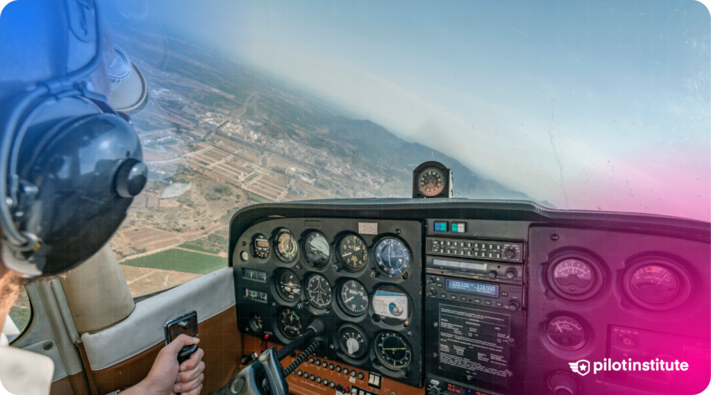A cockpit view of a small aircraft in flight, with a pilot's hand on the yoke and a scenic landscape visible through the windshield, displaying the Pilot Institute logo.