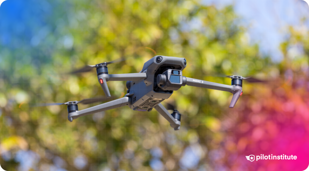 DJI Mavic 3 drone in flight outdoors with blurred green foliage background and subtle blue-pink gradient overlay, branded with Pilot Institute logo.